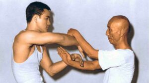 bruce lee and yip man training chi sau